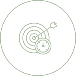 A person riding a bicycle on a dirt path with a scenic mountainous background.